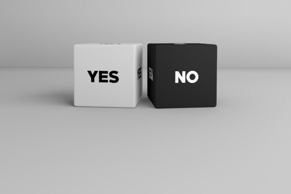 black and white yes no dice cube on white background